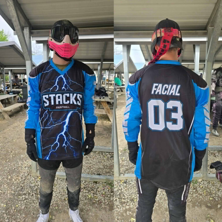 A player of the Stacks Paintball Team shows the new paintball jersey from custompaintball.co