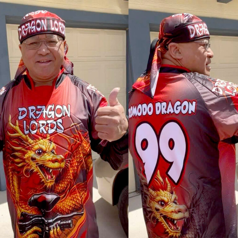 After receiving the "Dragon Lords" paintball jersey from custompaintball.co, the man shows his happiness.