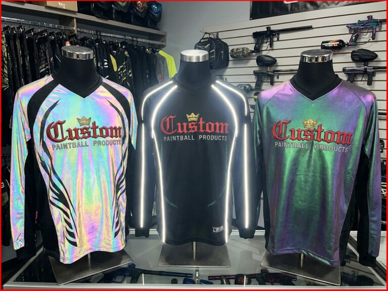 Compare iridescent ink sublimation, reflective piping, and chameleon-effect fabric for custom paintball jerseys